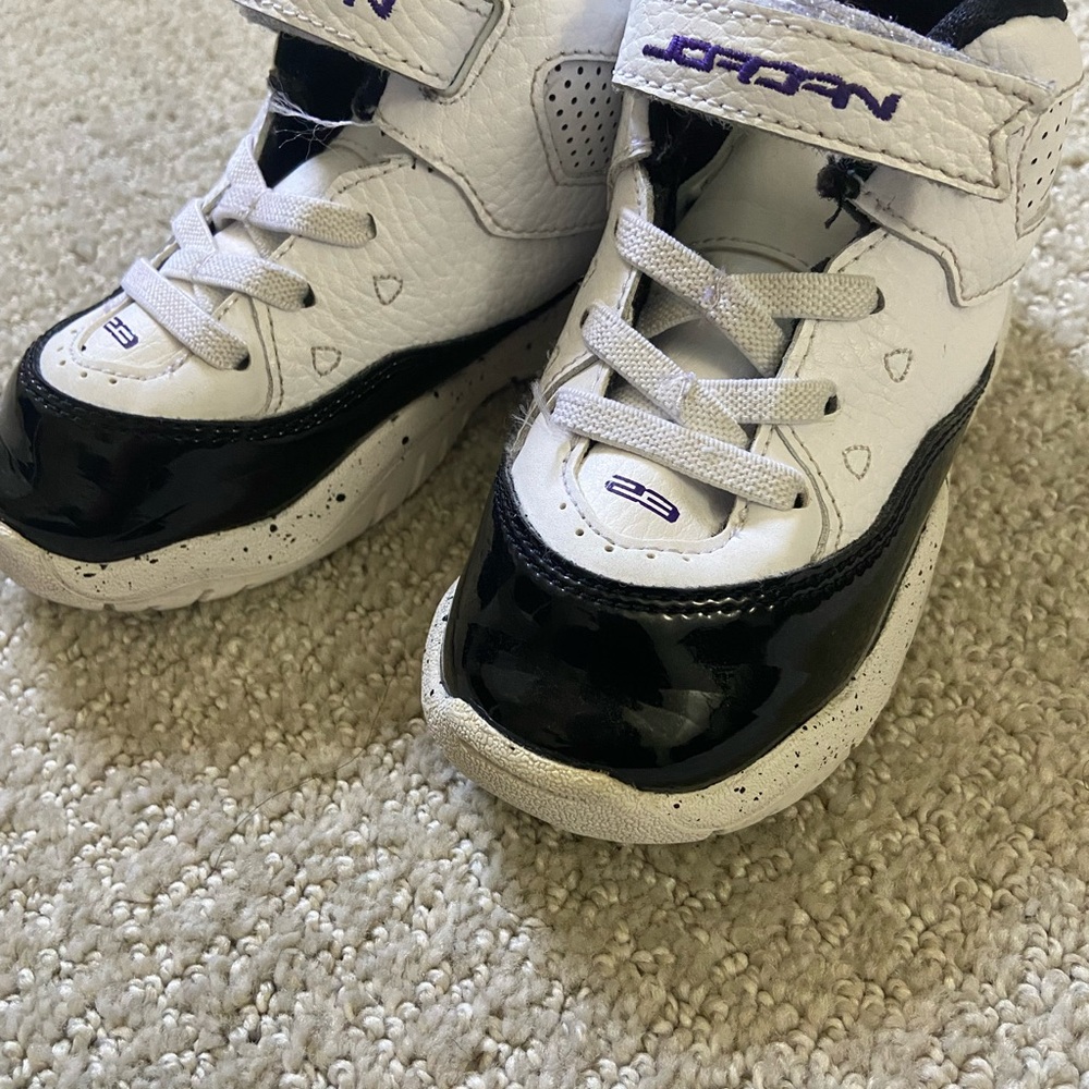 Jordan Kids' White and Black Sneakers with Purple Accents
